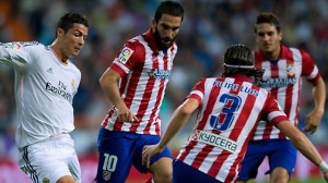 Cristiano Ronaldo contrastato dai calciatori dell'Atletico (foto dalla rete)