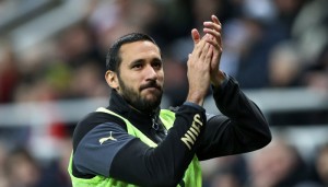 Newcastle United's Jonas Gutierrez  gestures to the fans as he warms up during their English Premier League soccer match between Newcastle United and Manchester United at St James' Park, Newcastle, England, Wednesday, March, 4, 2015. Jonas Gutierrez returned to the Newcastle team last week after being given the all-clear from testicular cancer in November 2014. (AP Photo/Scott Heppell)